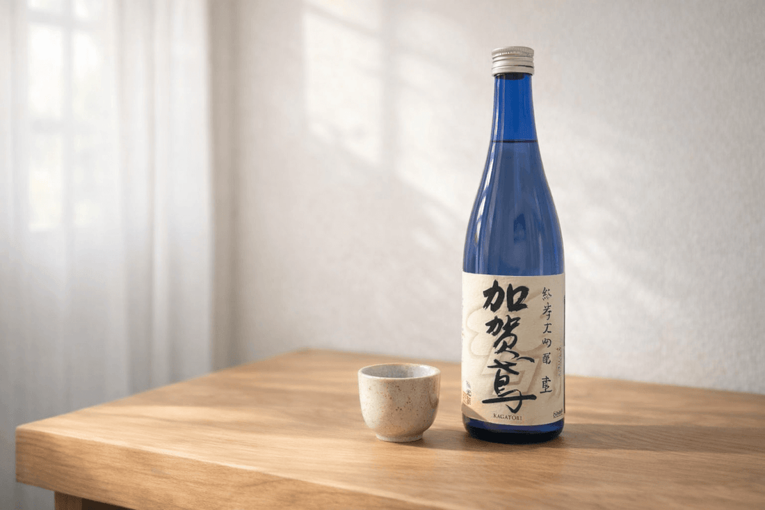 Beginner-friendly Japanese sake bottle with tasting cup emphasizing smooth flavor