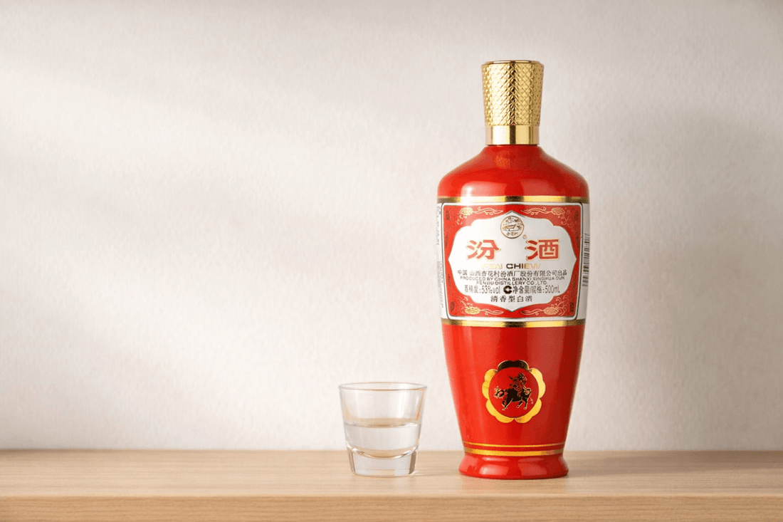 Fen Chiew baijiu bottle with tasting glass representing clean and light Chinese spirit style