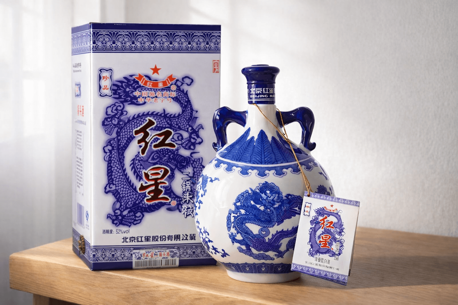 Blue and white ceramic baijiu bottle displayed with matching gift box.