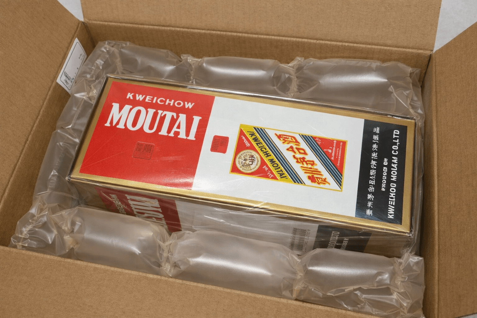 Kweichow Moutai bottle packaged securely inside a shipping box.