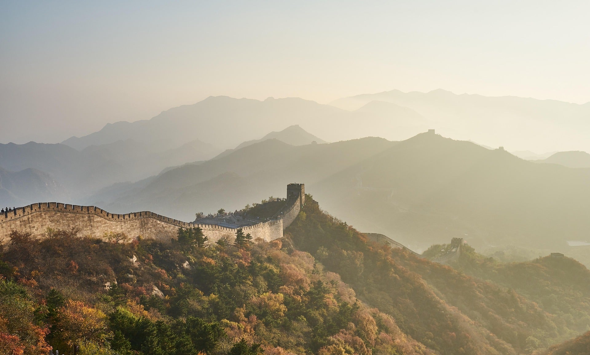 Section of the Great Wall of China with mountains in the background